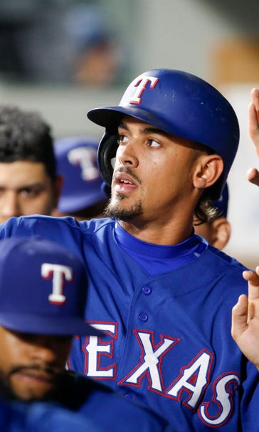 Rangers break through in seventh, beat Mariners 2-0